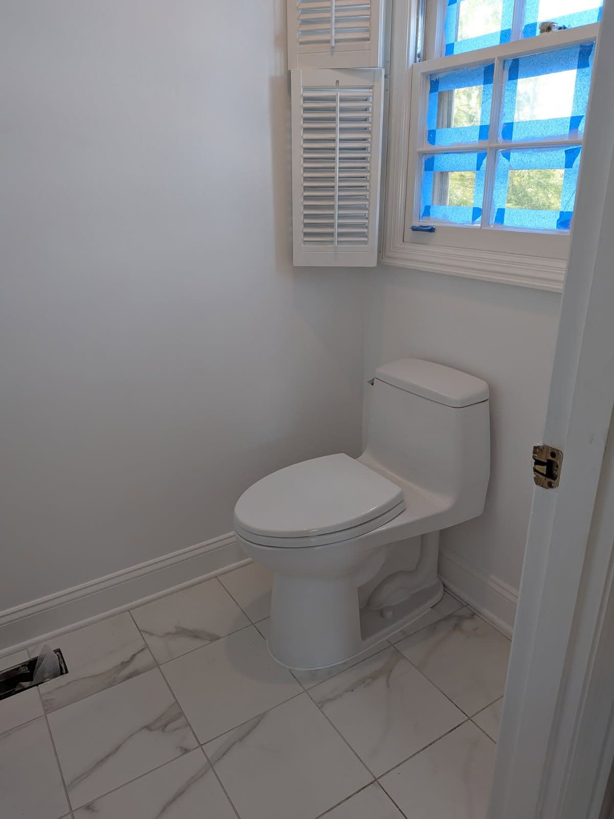 Gallery photos for Sleek Double-Sink Vanity and Toilet Upgrade in Chattanooga: Image #1